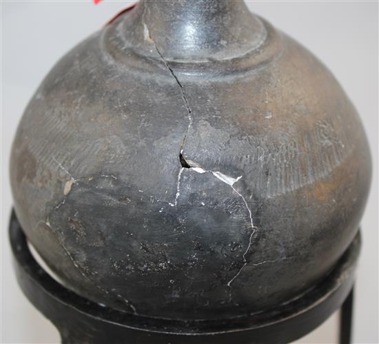 A Greek blackware bottle, Apulia, c.2nd century BC, 15cm, later metal stand